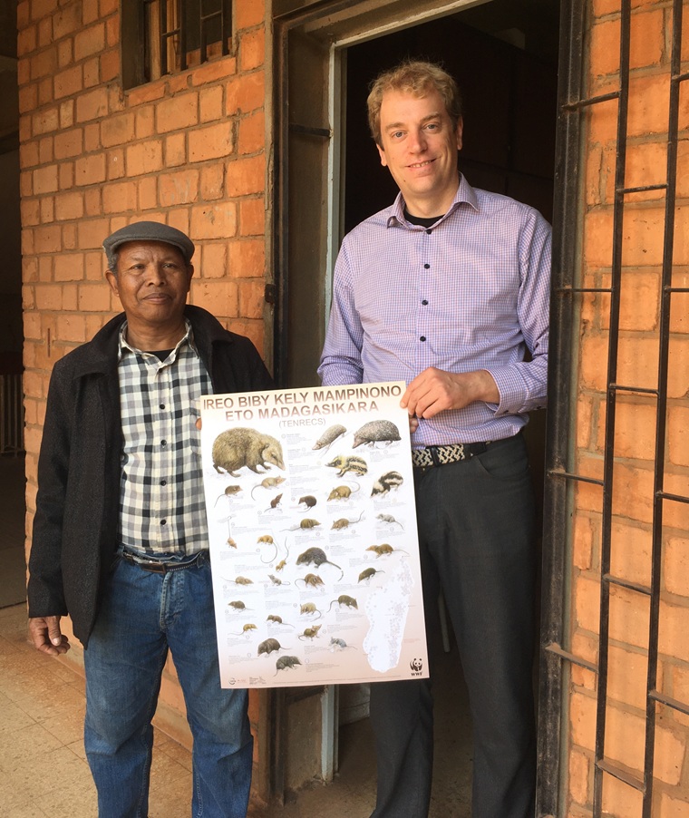 Handing over of tenrec posters to Félix Rakotondraparany, Université d'Antananarivo, in 2024. Copyright D. Kupitz